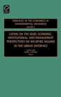 Image for Living on the edge  : economic, institutional and management perspectives on wildfire hazard in the urban interface