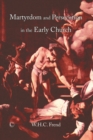 Image for Martyrdom and persecution in the early church  : a study of a conflict from the Maccabees to Donatus