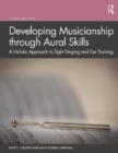 Image for Developing musicianship through aural skills  : a holistic approach to sight singing and ear training