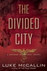 Image for The divided city : 3