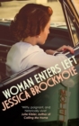 Image for Woman enters left