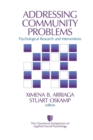 Image for Addressing community problems  : research and intervention