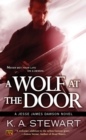 Image for A wolf at the door: a Jesse James Dawson novel