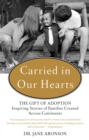 Image for Carried in our hearts: the gift of adoption inspiring stories of families created across continents