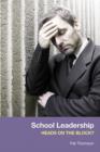 Image for School leadership: heads on the block