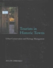 Image for Tourists in historic towns  : urban conservation and heritage management