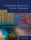 Image for Conducting research in human geography  : theory, methodology and practice