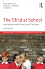 Image for The child at school: interactions with peers and teachers.