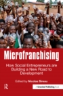 Image for Microfranchising: how social entrepreneurs are building a new road to development