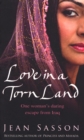Image for Love in a torn land: one woman&#39;s daring escape from Saddam&#39;s poison gas attacks on the Kurdish people of Iraq