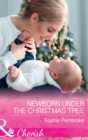 Image for Newborn under the Christmas tree.