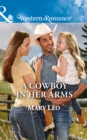 Image for A cowboy in her arms
