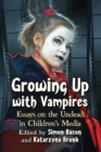 Image for Growing up with vampires: essays on the undead in children&#39;s media