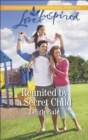 Image for Reunited by a Secret Child