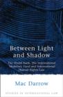 Image for Between light and shadow  : the World Bank, the International Monetary Fund and international human rights law