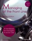 Image for Managing at the front line  : a handbook for managers in social care