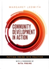 Image for Community development in action  : putting Freire into practice
