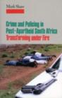 Image for Crime and policing in post-apartheid South Africa  : transforming under fire