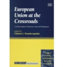 Image for European Union at the crossroads  : a critical analysis of monetary union and enlargement