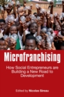 Image for Microfranchising  : how social entrepreneurs are building a new road to development