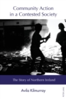 Image for Community action in a contested society  : the story of Northern Ireland