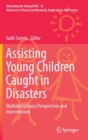 Image for Assisting Young Children Caught in Disasters : Multidisciplinary Perspectives and Interventions