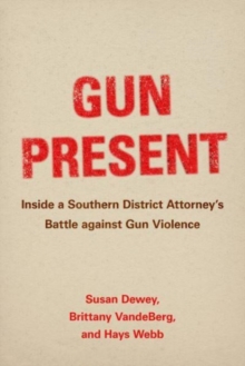 Image for Gun present  : inside a Southern district attorney's battle against gun violence
