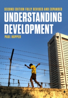 Image for Understanding development: issues and debates